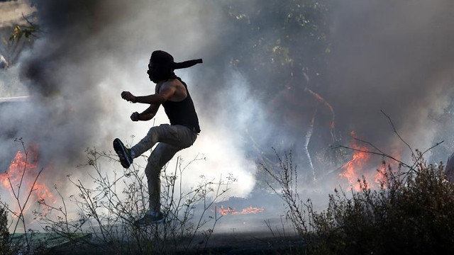 Enfrentamientos entre palestinos y el Ejército israelí. ALAA BADARNEH (EFE)