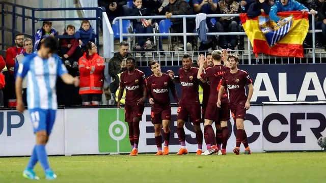 Los jugadores del Barcelona celebran un gol ante el Málaga. EFE