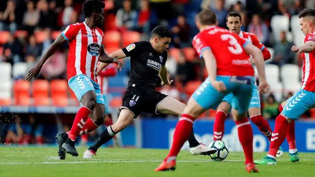 Un lance del Lugo - Huesca. ELISEO TRIGO (EFE)