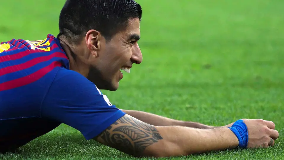 Luis Suárez firmó un triplete ante el Madrid. ENRIC FONTCUBERTA (Efe)