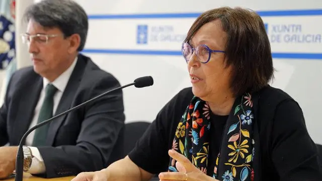 El director general de Xustiza, Juan José Martín, y la responsable del Imelga, Beatriz Otero. LAVANDEIRA JR.