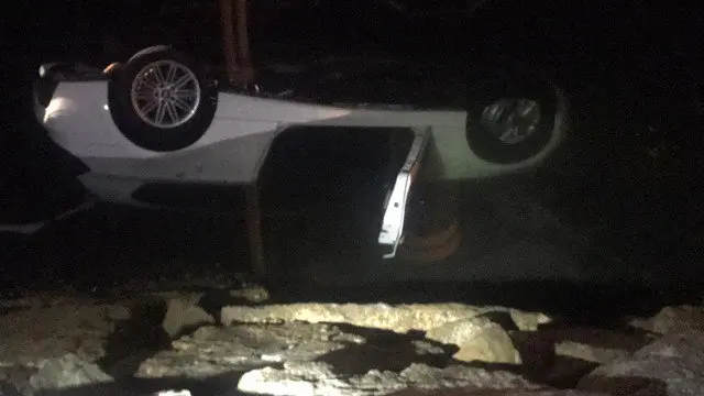 El veh&iacute;culo, tras caer al agua en Bouzas. POLIC&Iacute;A NACIONAL