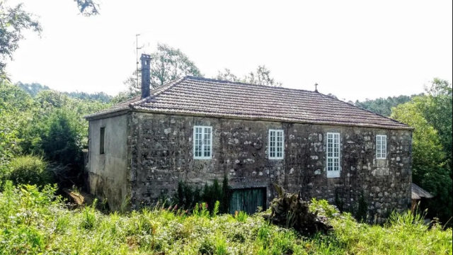 Vista exterior da Casa da Poza, situada no corazón de Galicia. EP