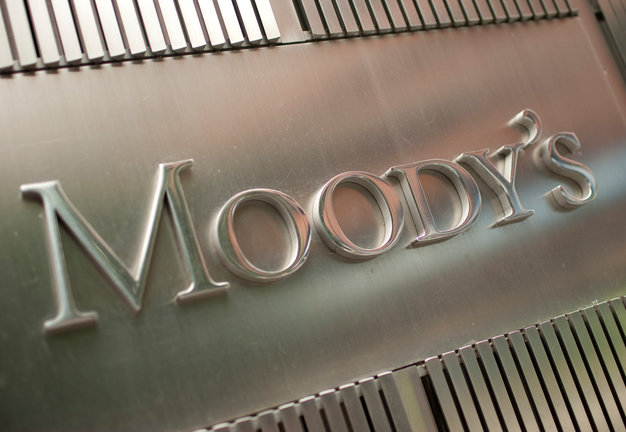 The Moody's Investors Service Inc. logo is displayed outside of the company's headquarters in New York, U.S., on Thursday, July 28, 2011. Moody's Investors Service, Standard & Poor's and Fitch Ratings have said they may consider lowering the nation's top rating if officials fail to resolve the stalemate. Photographer: Scott Eells/Bloomberg