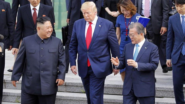 Kim Jong-un junto a Donald Trump. EFE