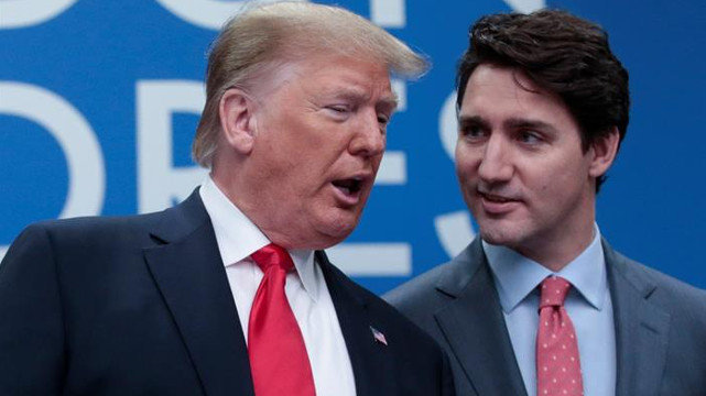 Trump y el primer ministro canadiense Justin Trudeau. OLIVIER HOSLET