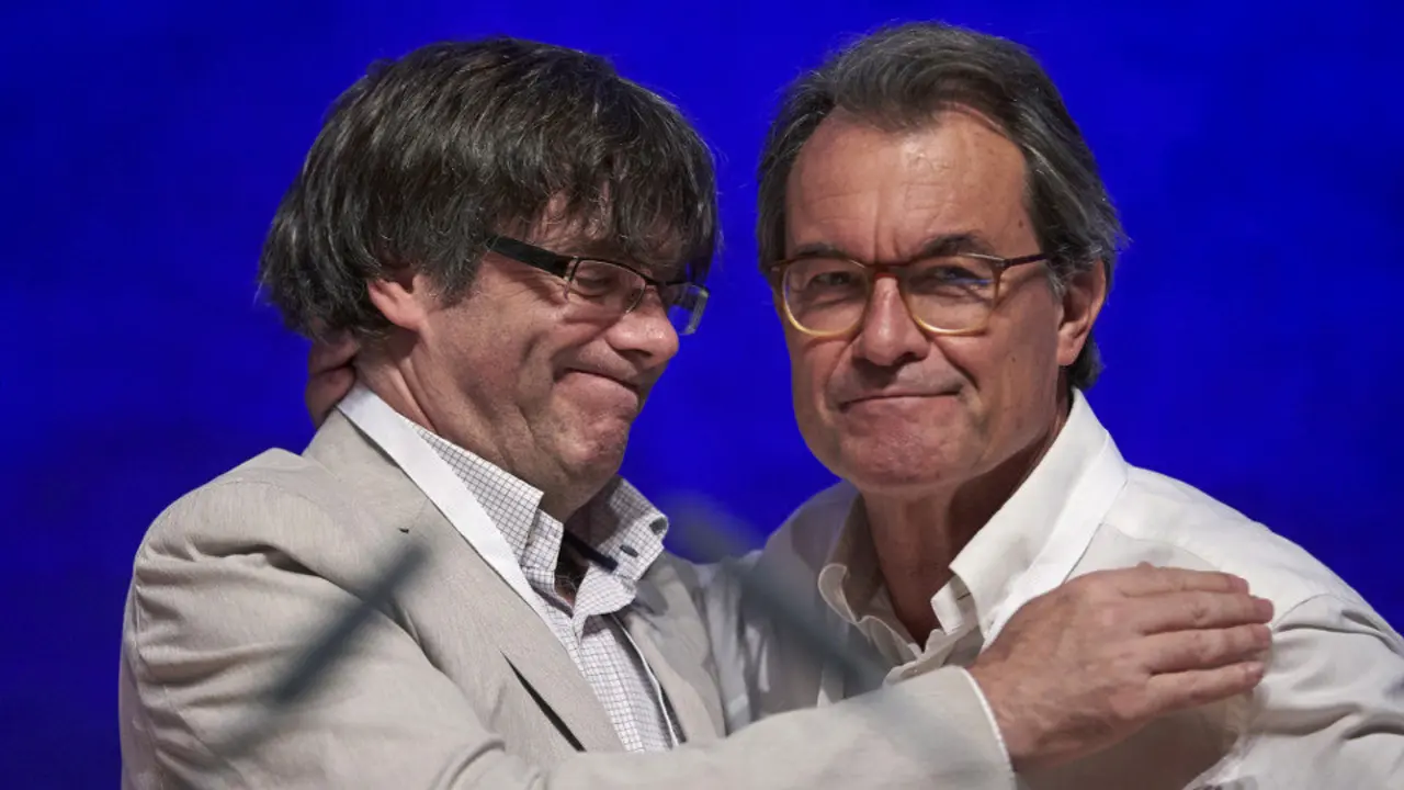 Carles Puigdemont y Artur Mas, en un acto del PdeCat. EFE