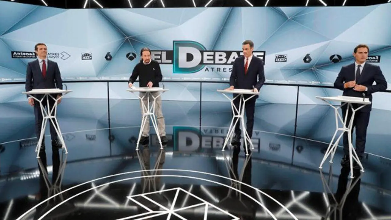 Los cuatro candidatos, tras los atriles en el plató de Atresmedia. EFE