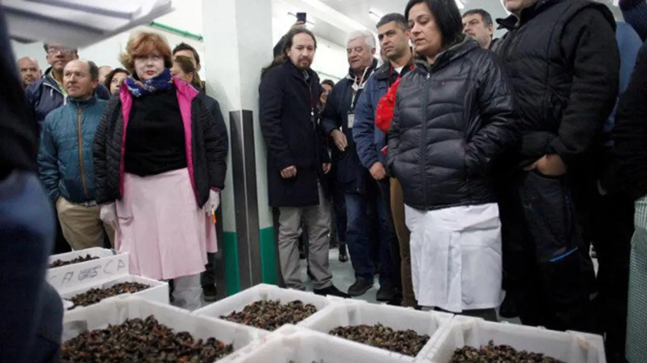 Iglesias y los candidatos de En Común Unidas Podemos al Congreso en la lonja de A Coruña. CABALAR