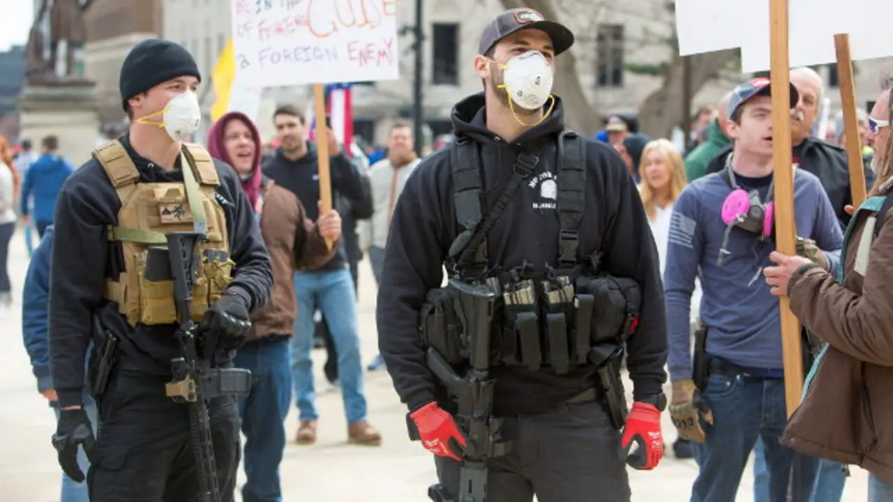 Varios manifestantes exhibieron rifles y armas de fuego.JEFFREY SAUGER (Efe)