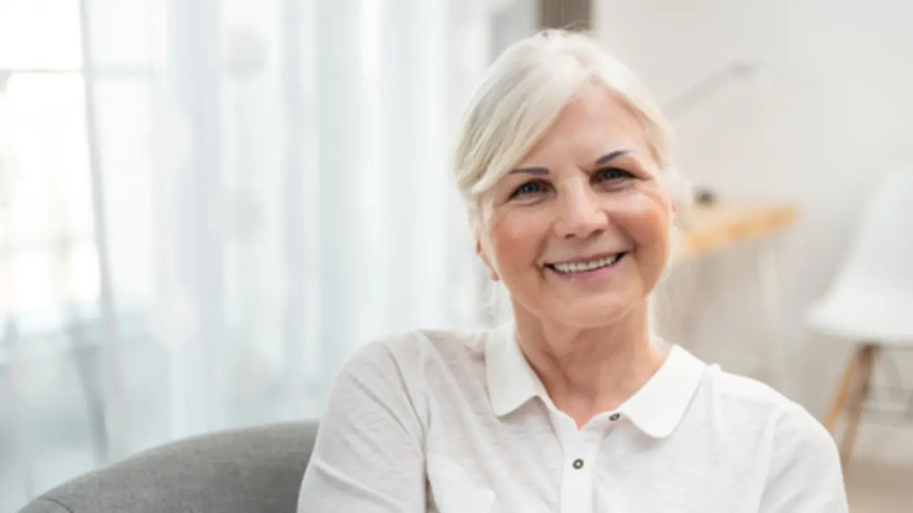 Portrait of smiling senior woman. Concept of lifestyle photo with copy space