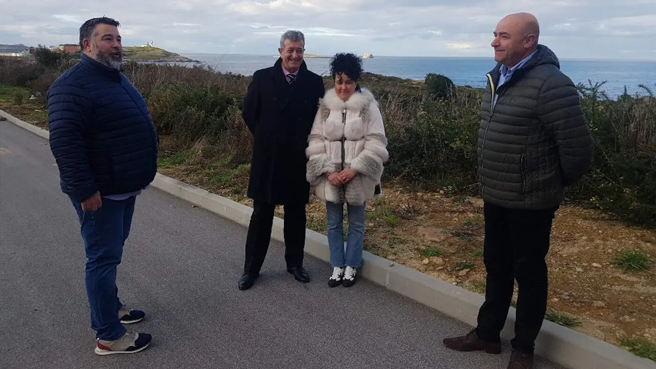 Luque en el centro, con Piñeiro a la izquierda en la imagen y Villamayor a la derecha. EP