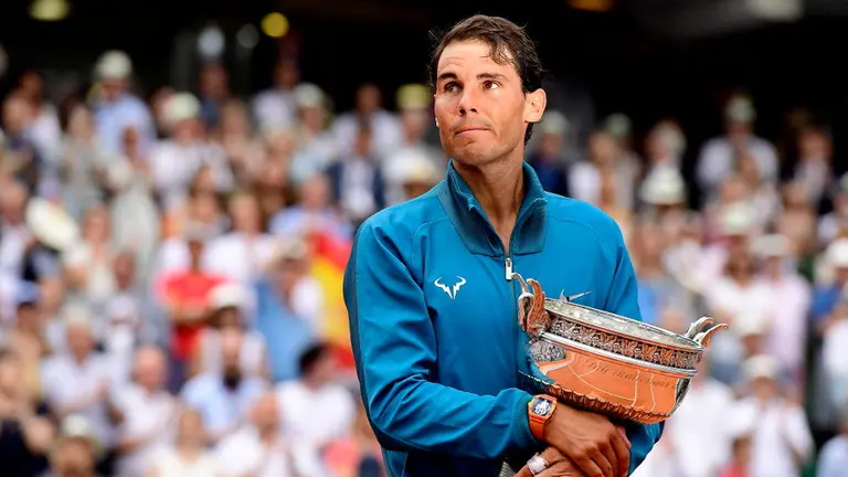 Rafa Nadal, con su und&eacute;cimo Roland Garros. CAROLINE BLUMBERG