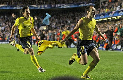 Barcelona's Andres Iniesta, right, celebrates after scoring his sides equalising goal during their Champions League semifinal second leg soccer match against Chelsea at Chelsea's Stamford Bridge stadium in London, Wednesday, May, 6, 2009. (AP Photo/ Matt Dunham)